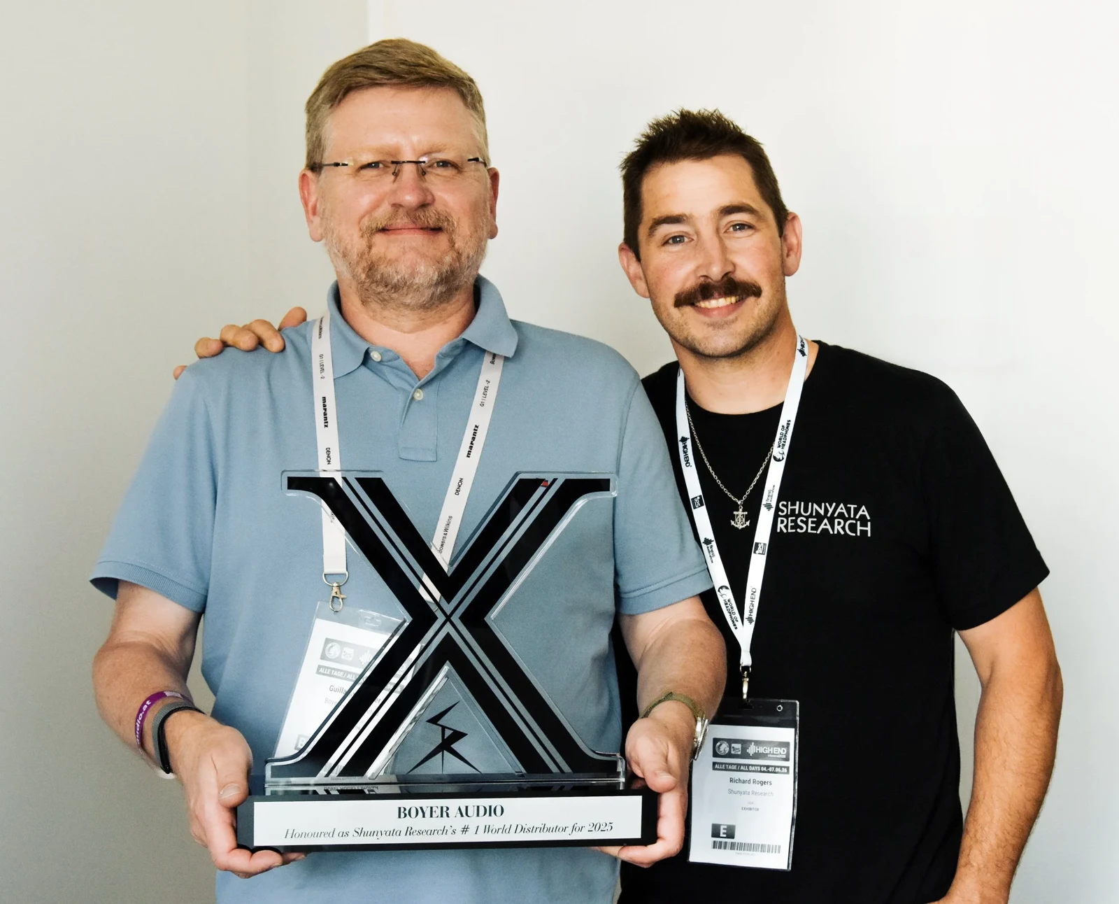 Guillaume Boyer with Richard Rogers of Shunyata Research and the award naming Boyer Audio Shunyata Research’s number one world distributor for 2025
