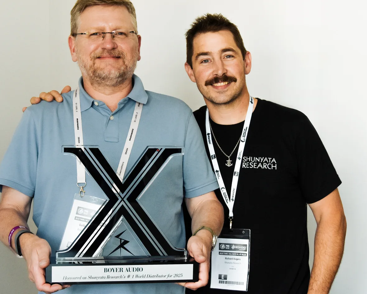 Guillaume Boyer and Richard Rogers holding the Shunyata Research number one world distributor award for 2025.